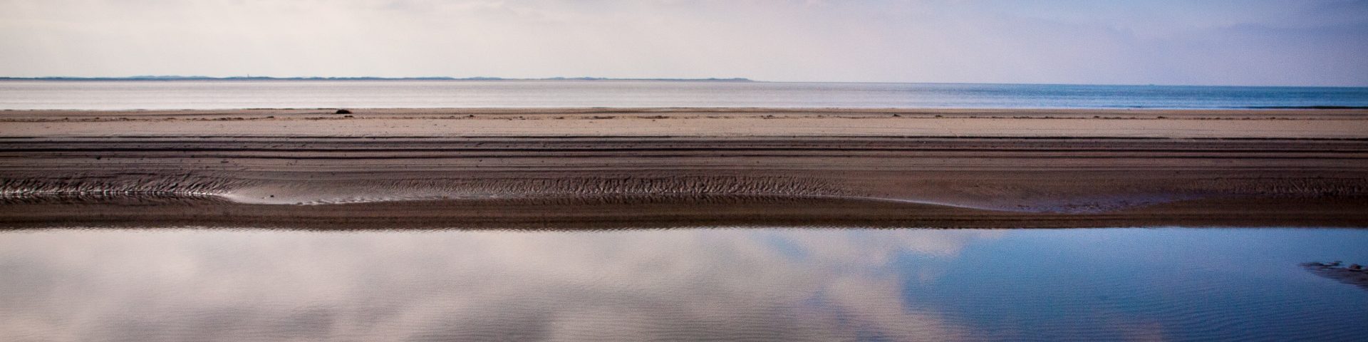 Rømø Strand bei Ebbe Urlaub mit Baby